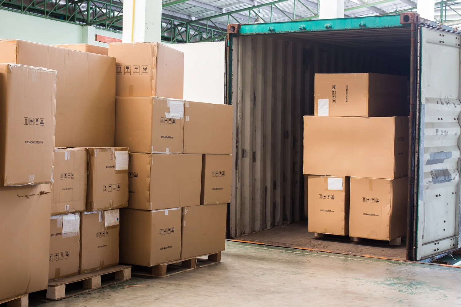 Packed cartons being loaded for transport