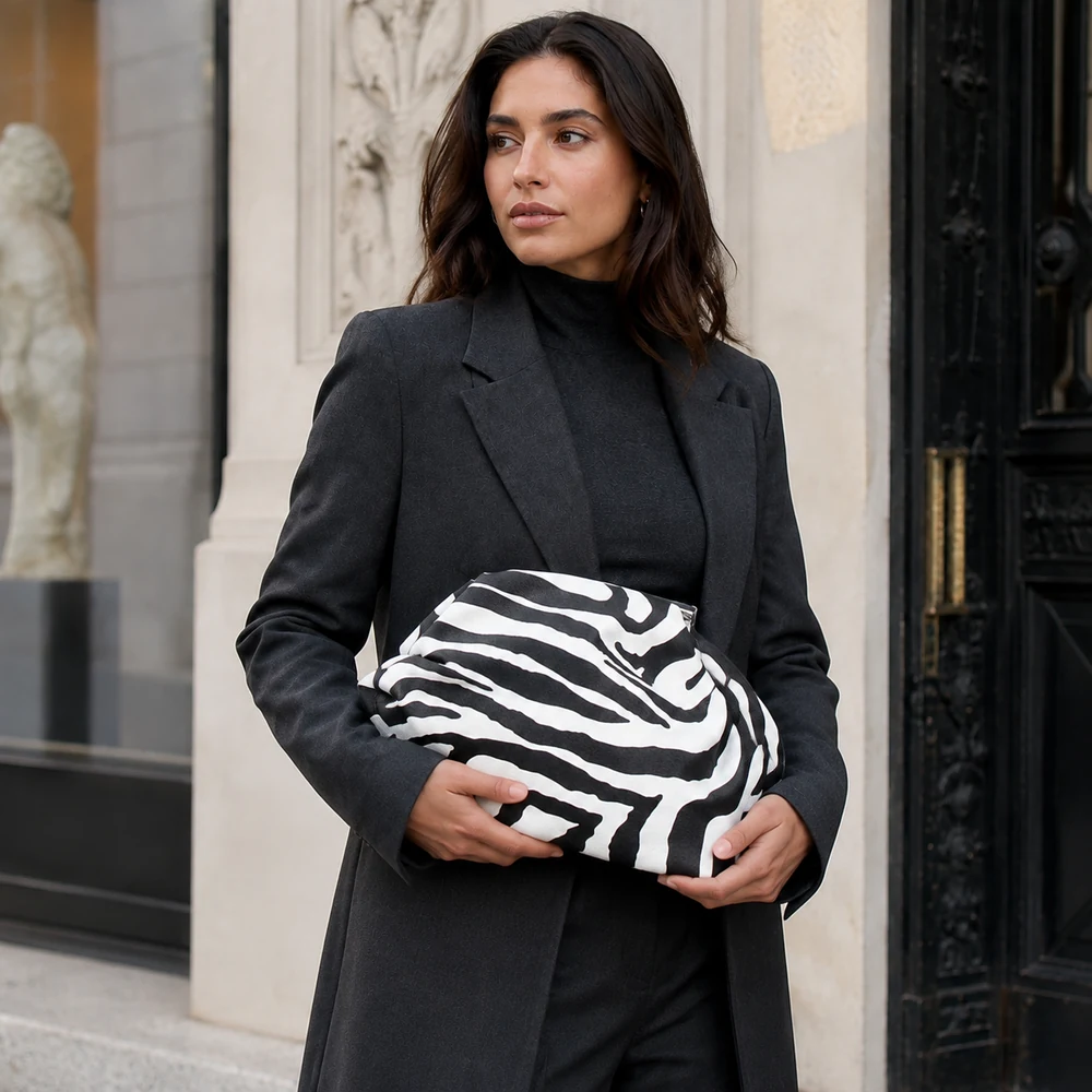 bold-stripes-black-white-zebra-faux-leather-clutch-model-portrait-02 Wholesale Black and White Zebra Faux Leather Clutch - main view