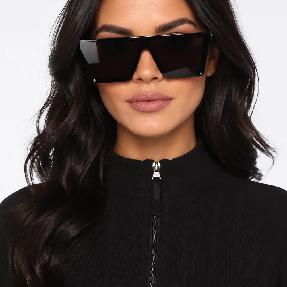 catching-flights-black-flat-top-shield-sunglasses-front-01 Black flat-top shield sunglasses, front wearing portrait