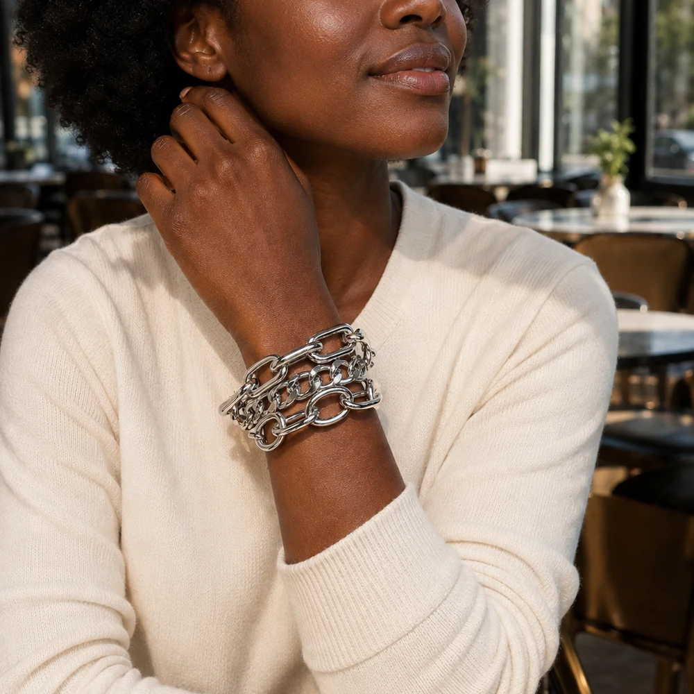 never-the-less-3-piece-silver-chain-bracelet-set-model-portrait-02 Three silver-tone mixed chain bracelets worn together