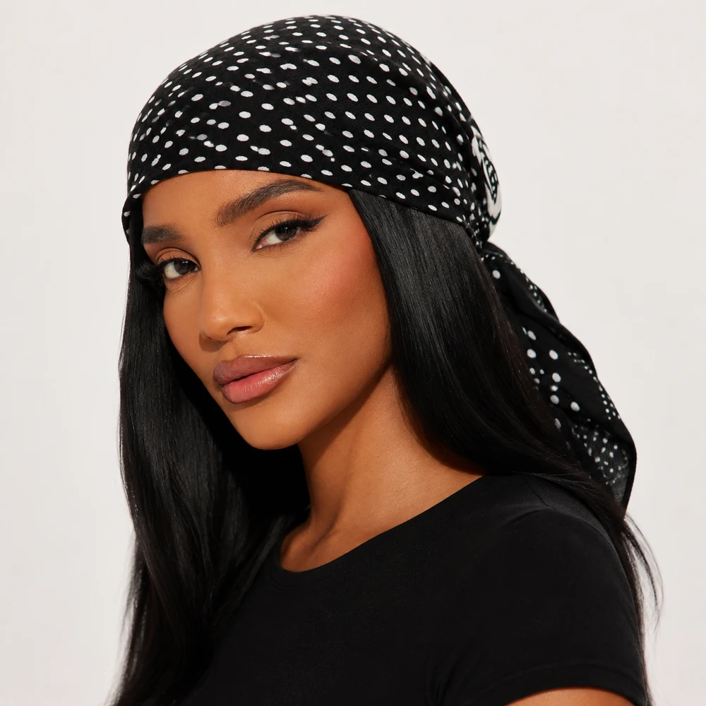 susie-black-white-polka-dot-head-wrap-front-02 Black and white polka dot head scarf worn as a tied head wrap